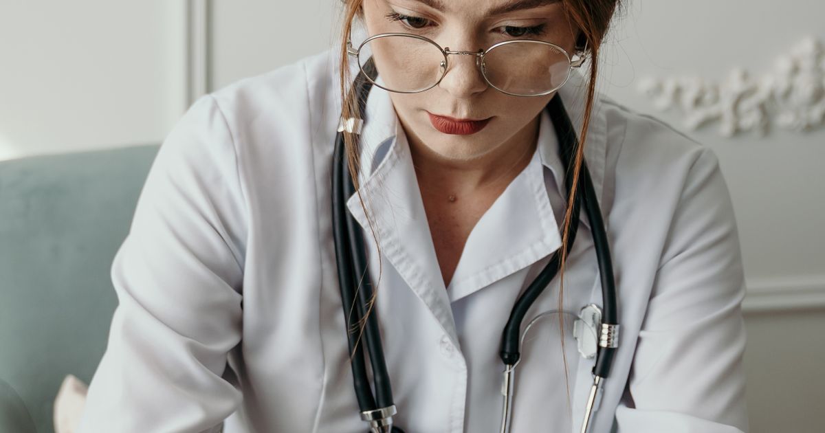 Doctor working on a laptop in an office