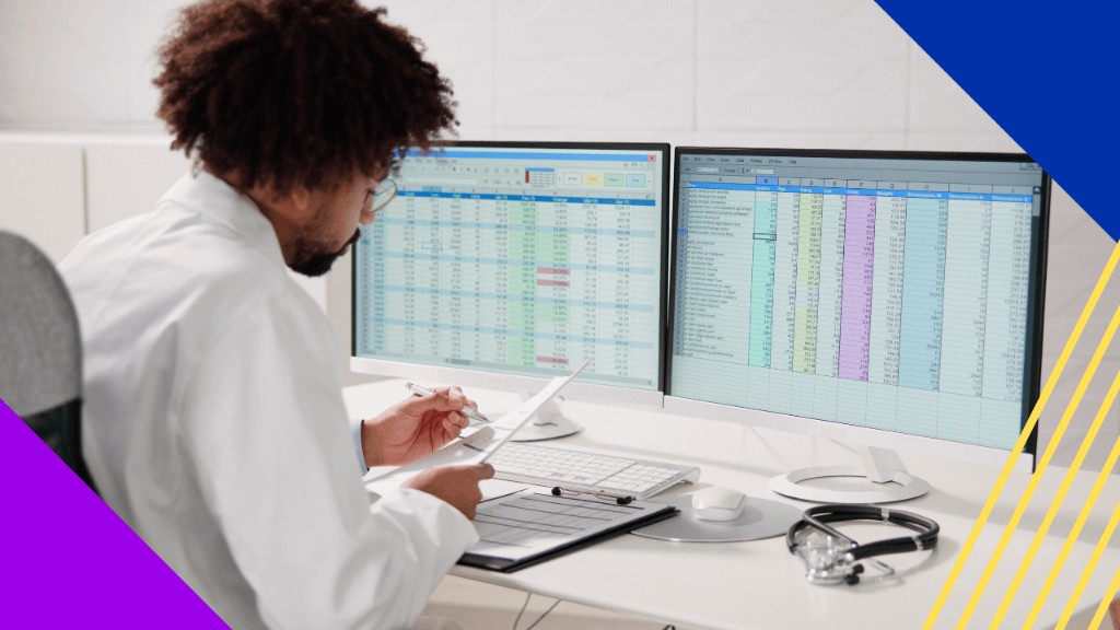 Medical billing specialist reviewing revenue cycle data on dual monitors