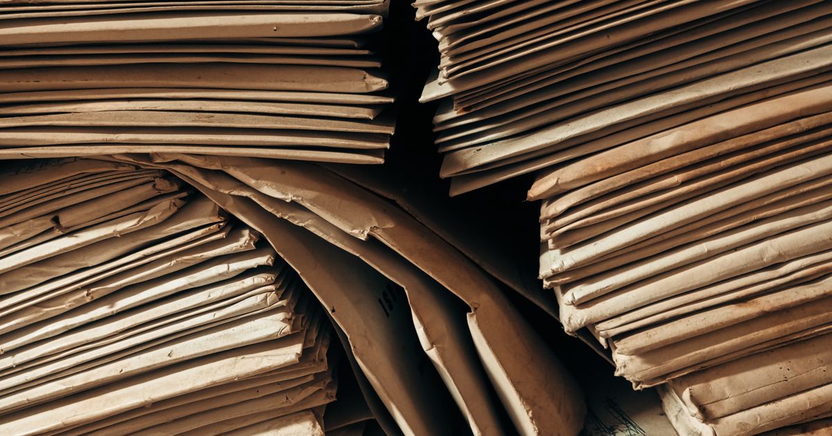 Stack of insurance claim paperwork under review
