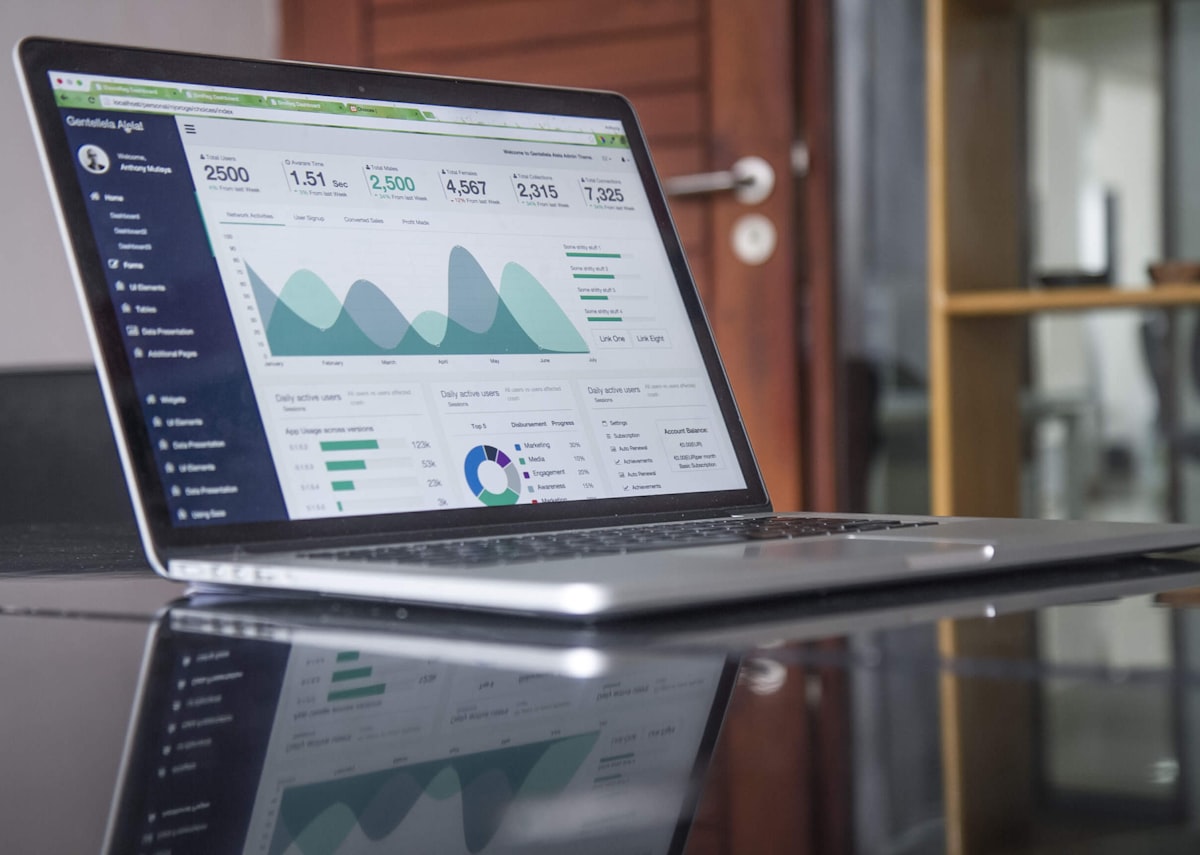 Medical practice management software on a laptop in a clinic