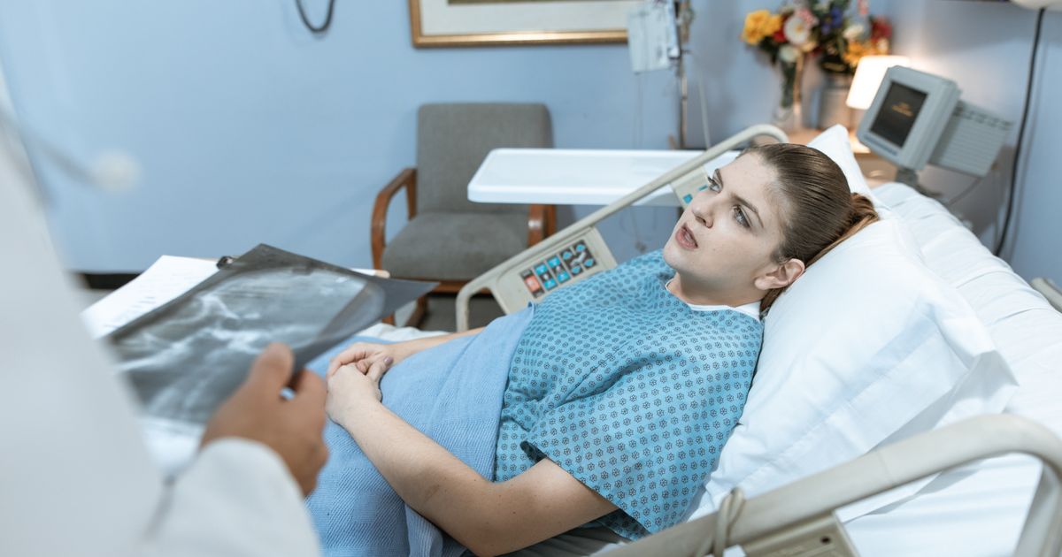 Hospital facility corridor and patient rooms